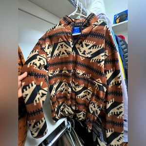 The Brand is Without Walls, Size Medium, Multicolored but mainly brown